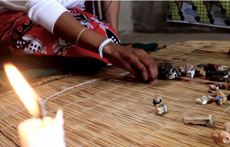 traditional healer performing a reading